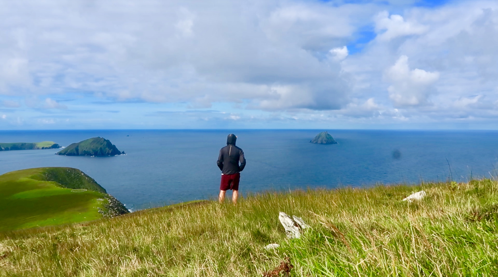 Derek Cullen overlooking the habor on the Great Blasket Island in Irleland